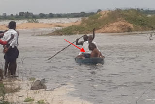 Locals rescue an insane man trapped in the Krishna River