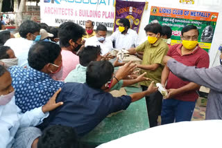 Clay Ganesh Idols Distributed by lions club in metpally