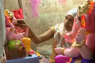 A Muslim woman making a Ganesh idol in Hubli.....