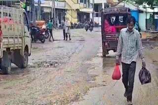 Damaged road in Gurumathkal town