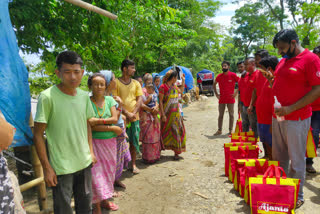 Flood relief distribution by Ajanta company at Jonai