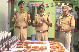 telangana liquor caught by guntur police and liquor seize