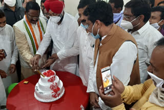 Food Minister Amarjeet Bhagat cut cake