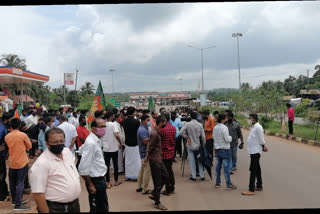 bjp  protest to remove border barricades