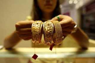 Gold declines Rs 557, silver tumbles Rs 1,606
