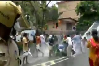 Police use water cannon to disperse BJP Yuva Morcha workers who are heading towards Kerala Secretariat