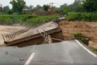 The bridge swept away like playing cards