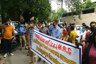 Teachers organization protests outside National Backward Commission in Delhi