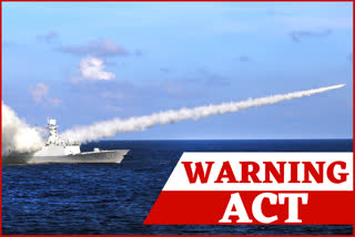 China fires 2 missiles into South China Sea to 'warn' USChina fires 2 missiles into South China Sea to 'warn' US