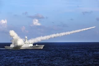 China fires 2 missiles into South China Sea to 'warn' US