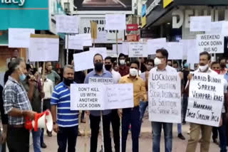 businessman protest against weekend lockdown in gurugram