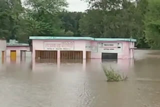 The river drain is in spate due to rain