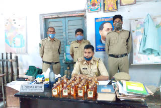 illegal liquor seized by seb and police officers in krishna, kadapa and chittoor district