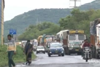 Heavy rain stops the wheels of trucks