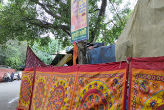 curtains on shops on the footpath