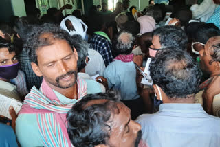 Crowding in order to take urea in Devarapalli Co-operative Society, Visakhapatnam District