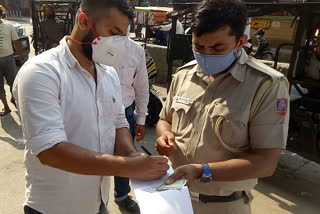 Delhi Police cut invoices of people not wearing masks