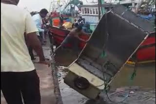 fish loaded vehicle fell down to beach