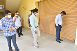 collector samuel anand visits evm's protected godown in guntur district