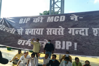 Aam Aadmi Party councilors protest against BJP at Civic Center