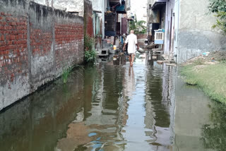 water logging in kishan vihar due to drainage overflow at mundka