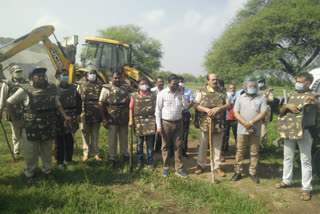 Bulldozer fired on illegal property of criminal