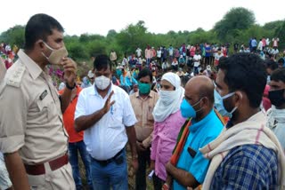 Villagers protesting to build crematorium