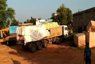 27 trolleys filled with illegal sand stone seized