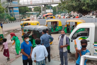 Auto drivers waiting for passengers outside Saket metro station