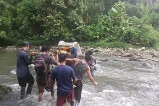 Lack of road connectivity forces Arunachal youth to carry ailing mother on shoulder