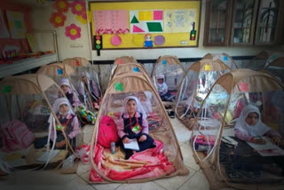 Iran Students studying inside a transparent tent