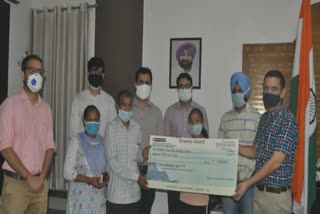 Kusum honored with check for Rs 1 lakh by punjab govt