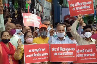BJP protest against kejriwal for distributing rotten ration kit in govt schools