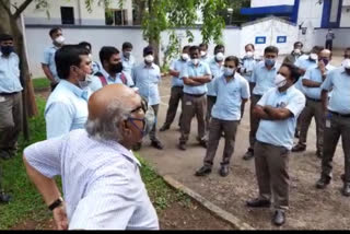 Workers protesting against wearing a black belt