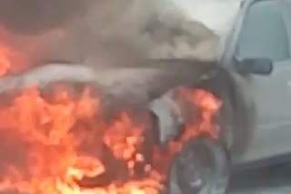 A sudden fire in a Maruti Esteem car in Karol Bagh Delhi