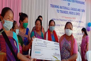 Check distribution program at diphu social welfare office assam etv bharat news