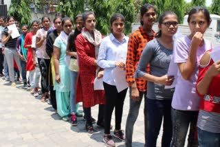 neet-exam-2020-spouses-waiting-at-exam-centers