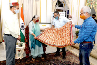 Governor  launched the Bhrigetka mural painting based on Mrignayani designer clothing series