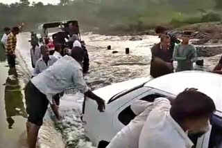 Car stuck in water flow