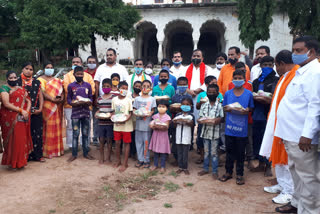 bjp leaders fruits distribution at lalapet