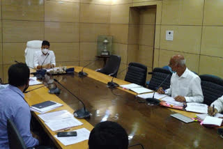 dc holds meeting with officials in dhanbad