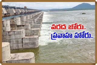 Flood flow Parvati Barrage 58 gates lifted at siripuram peddapalli district