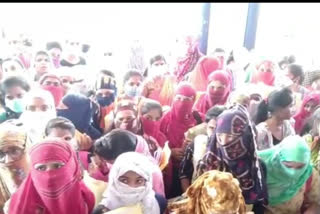 Crowds of students gathered to collect answer books