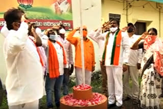 bjp leaders flag hoisting by bjp leaders at adilabad