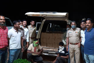 two arrested for liquor transport