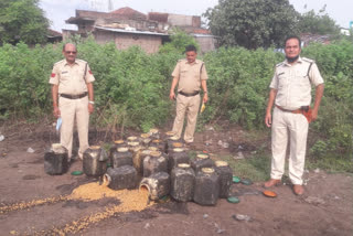 Excise department, taking action seized 30 liters of raw liquor and 750 kg mahua