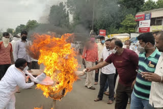 Swabhimani activists burning a symbolic statue of a Union Minister