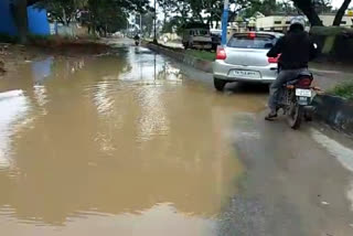 Heavy rain in Kolar Torn water on the road