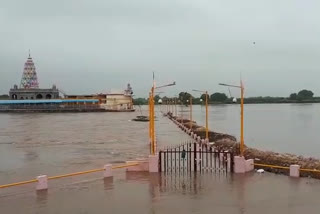 Water surrounds the Yallamma temple of Mannur village