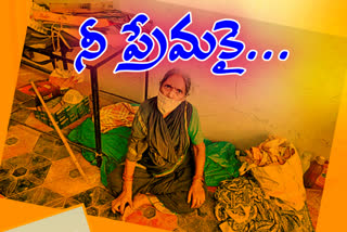 a old women waiting for her son in front of their home in nizamabad